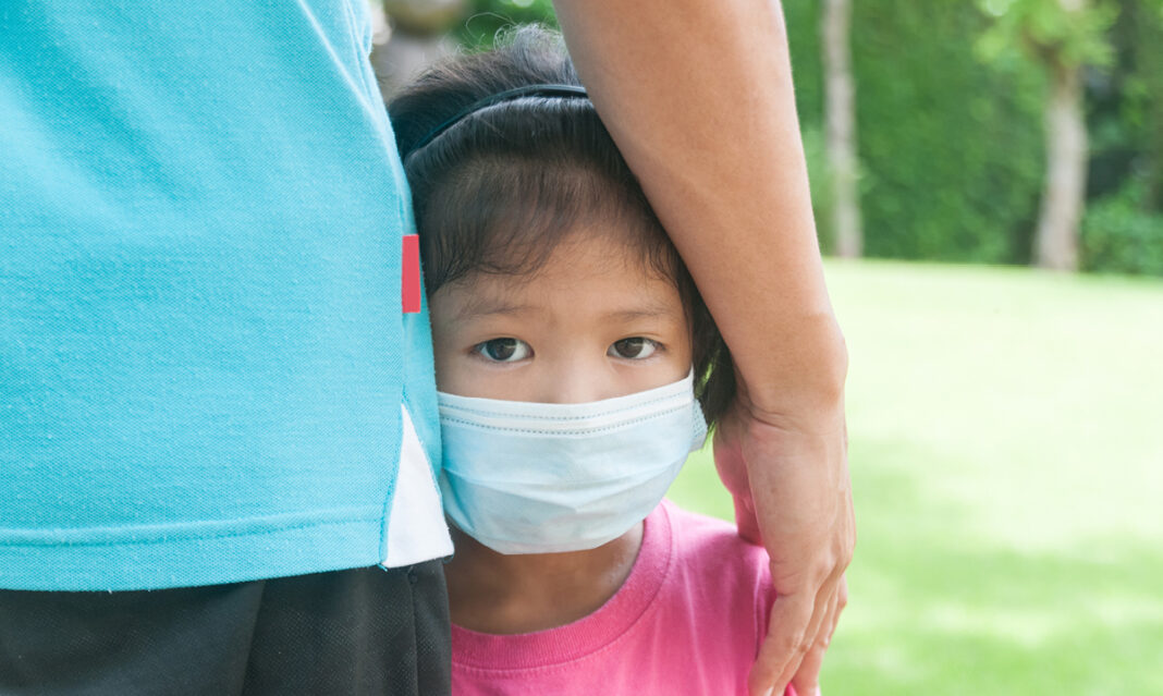 how-to-help-kids-get-used-to-being-around-people-again-photo-credit-istock-thampapon