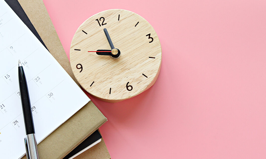 A clock and note pad to keep track of school deadlines