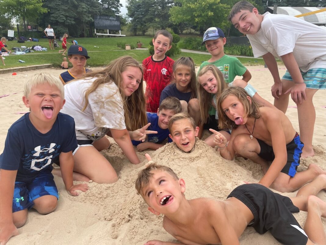 oakland-yard-athletics-fun-summer-camp-smiling-kids-in-sand