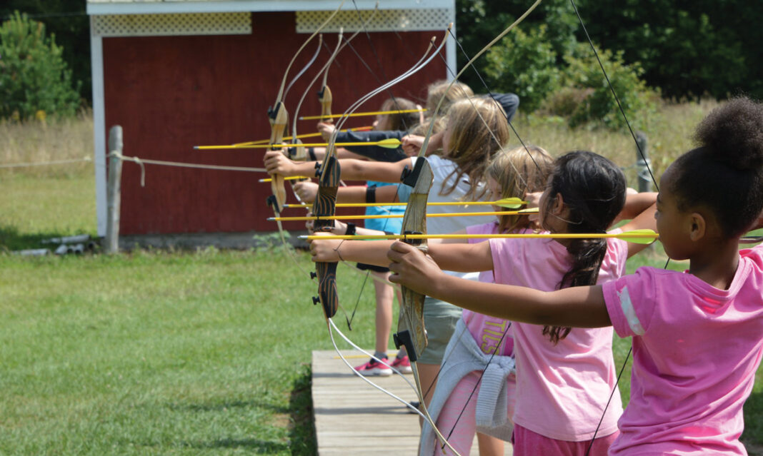 ymca-summer-day-camp-girls-doing-archery-having-fun