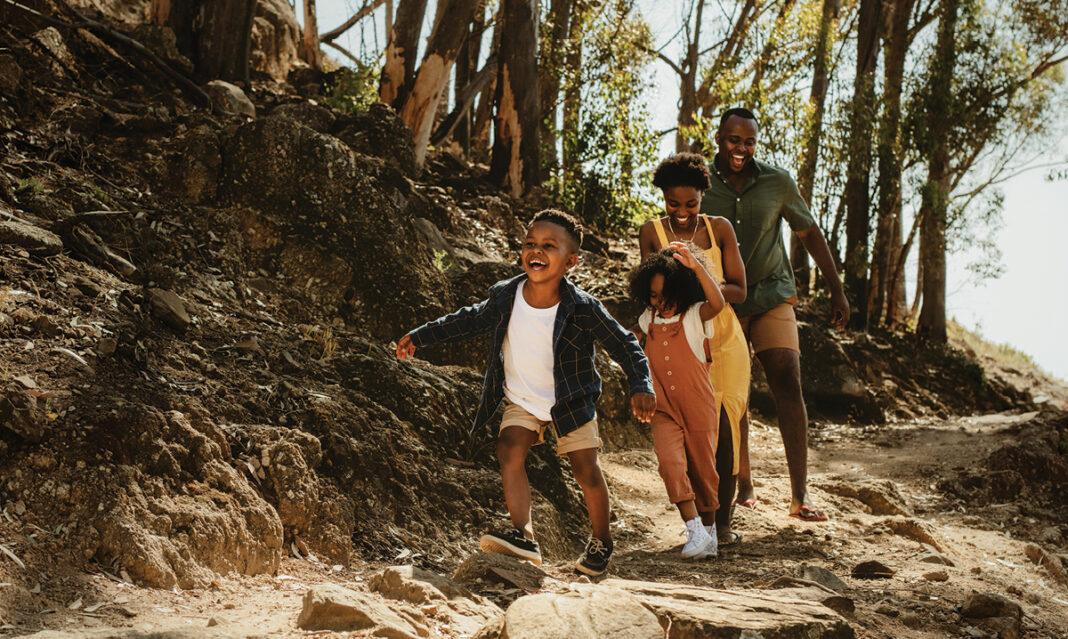 summer-progress-autism-family-enjoying-hike-in-woods