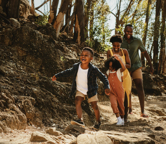 summer-progress-autism-family-enjoying-hike-in-woods