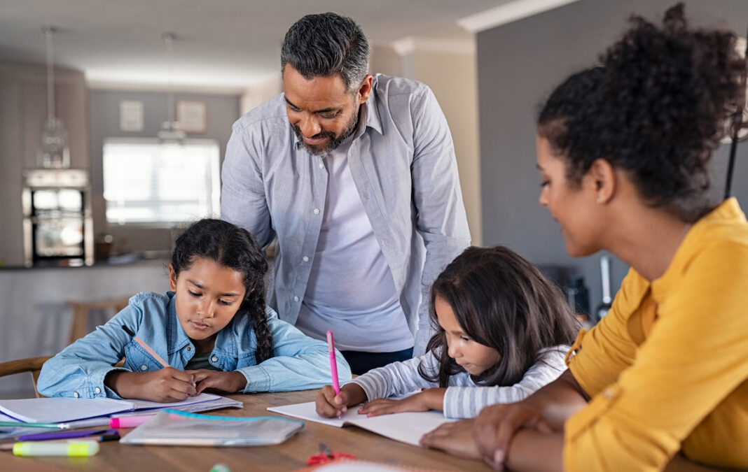 virtual-learning-right-for-your-family-mom-dad-two-girls-homeschooling