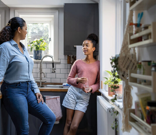 talking-to-kids-about-substance-use-mom-and-daughter-in-kitchen-talking-in-a-relaxed-way