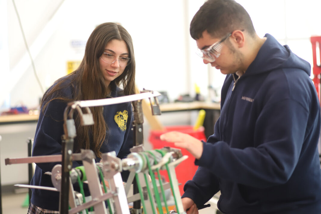 facts-about-charter-schools-two-students-work-hands-on-in-steam-learning-center