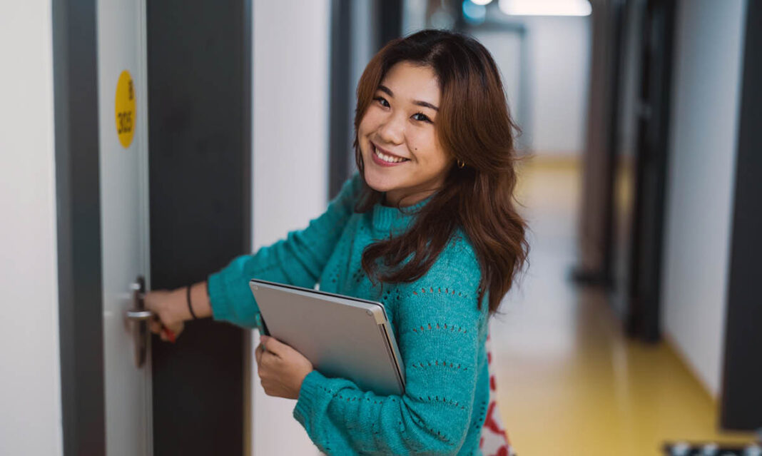 Female student in a student accommodation building