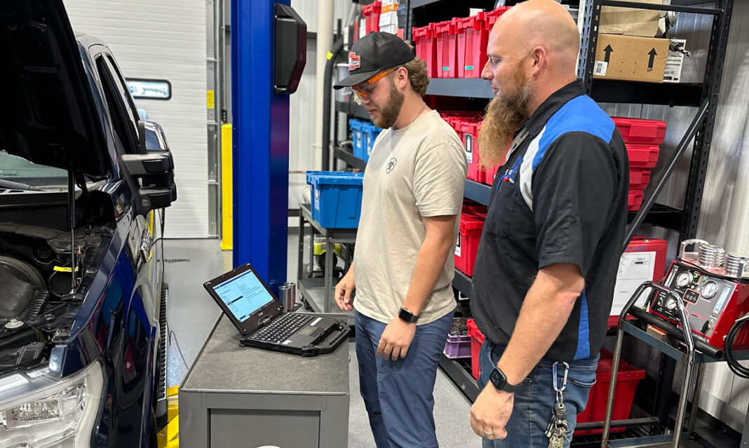 ford-asset-program-student-instructor-working-together