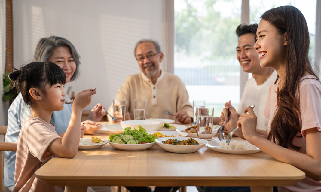 Extended family at the dinner table together