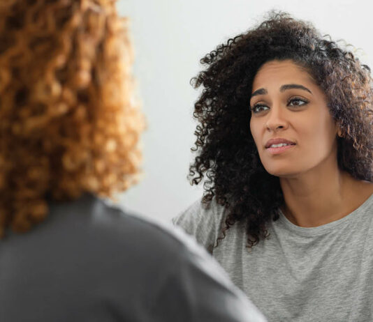 OCHN Woman talking with her friend