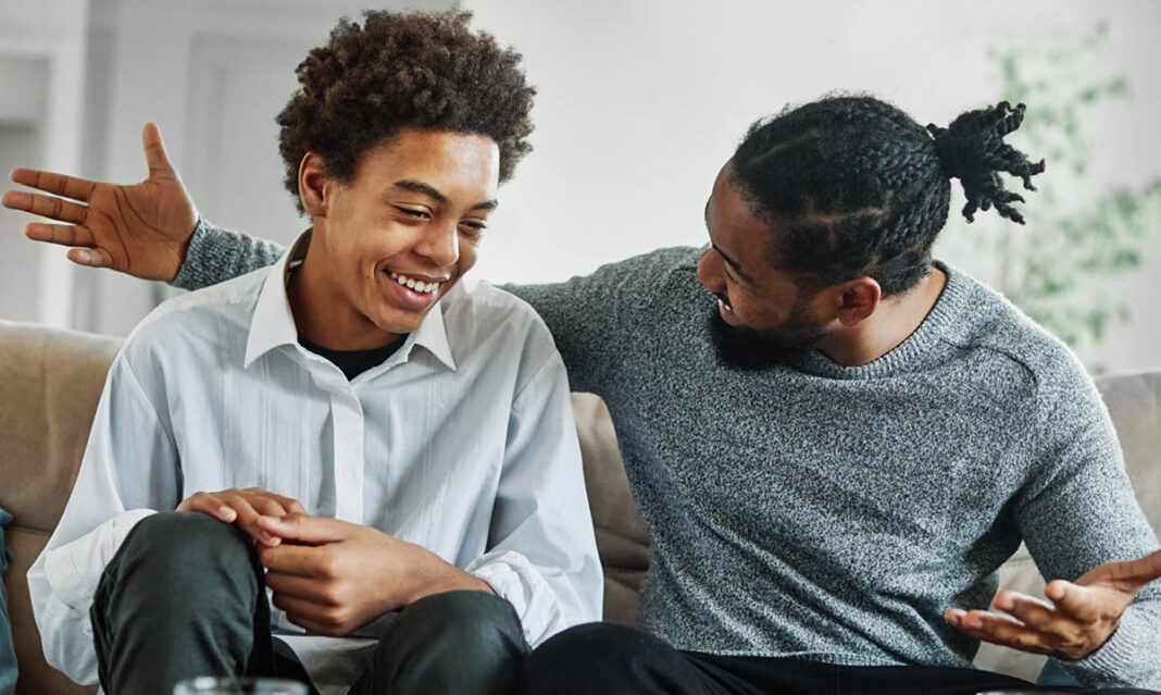 Father and son having a conversation about sex