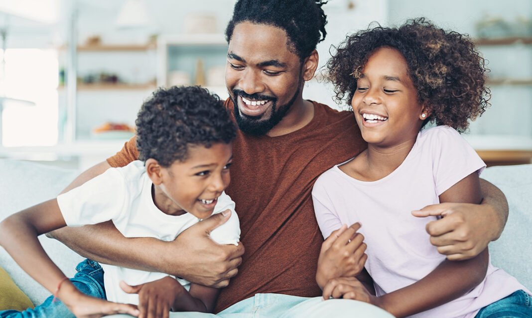 Father with his son and daughter spending quality time together