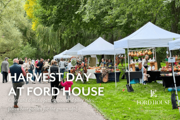 people walking and selling in stalls during harvest day at ford house