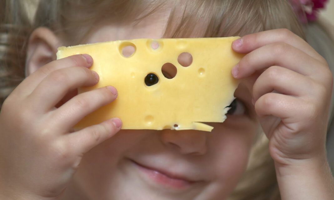 Toddler with cheese