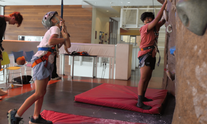 kids climbing on the wall