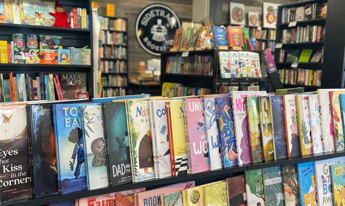 Display of colorful children’s books at Sidetrack Bookshop, a cozy and inviting independent bookstore in Metro Detroit.