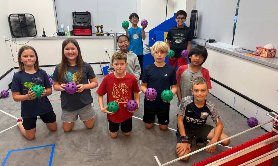 Students participate in hands-on STEM activities at The Future Innovators Academy summer camp in Ann Arbor.