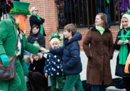 Families celebrate at the Royal Oak St Patrick’s Day Parade with kids meeting a leprechaun and enjoying a festive Irish community event