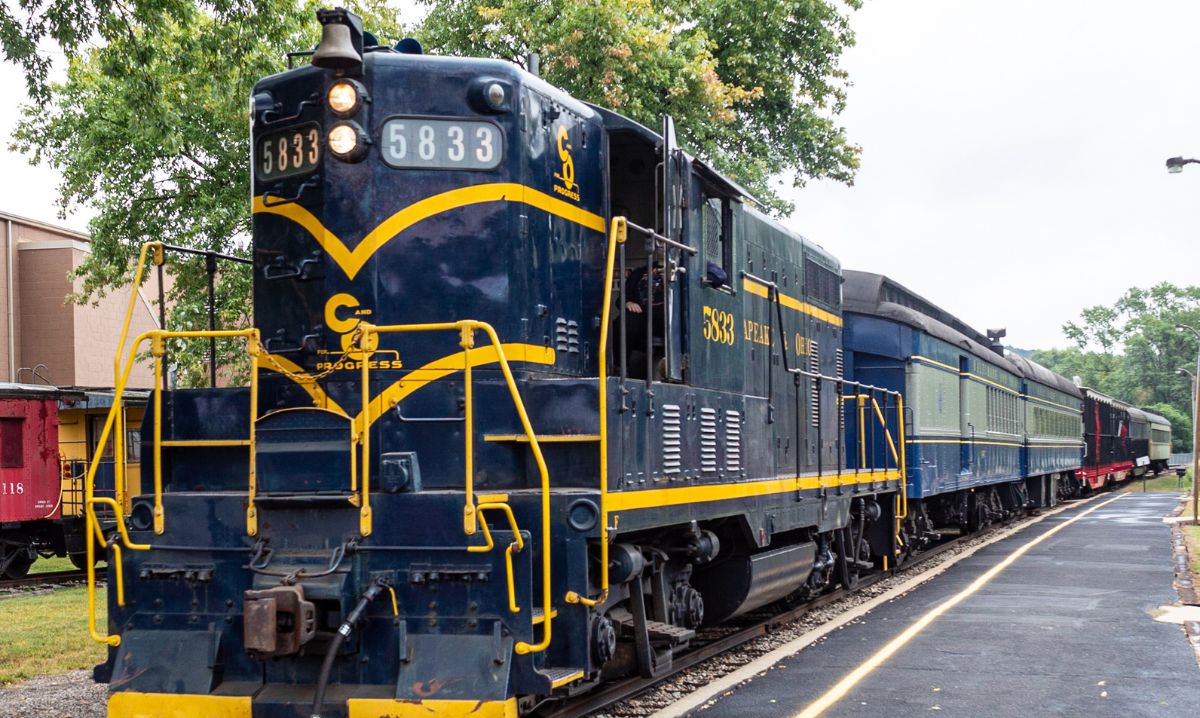 A telescope pointed towards the Milky Way in the night sky at Hocking Hills, Ohio, offering a breathtaking stargazing experience in a dark sky park.