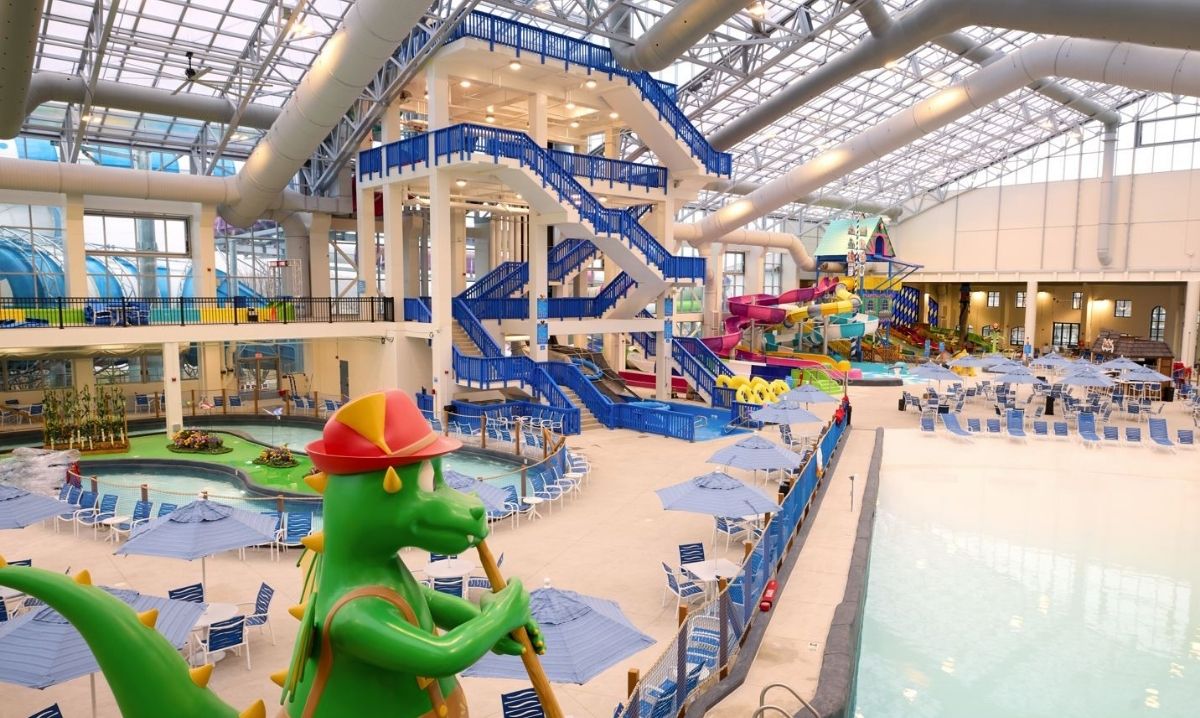 Families enjoying waterslides and wave pool at Bavarian Blast Waterpark in Frankenmuth, Michigan.