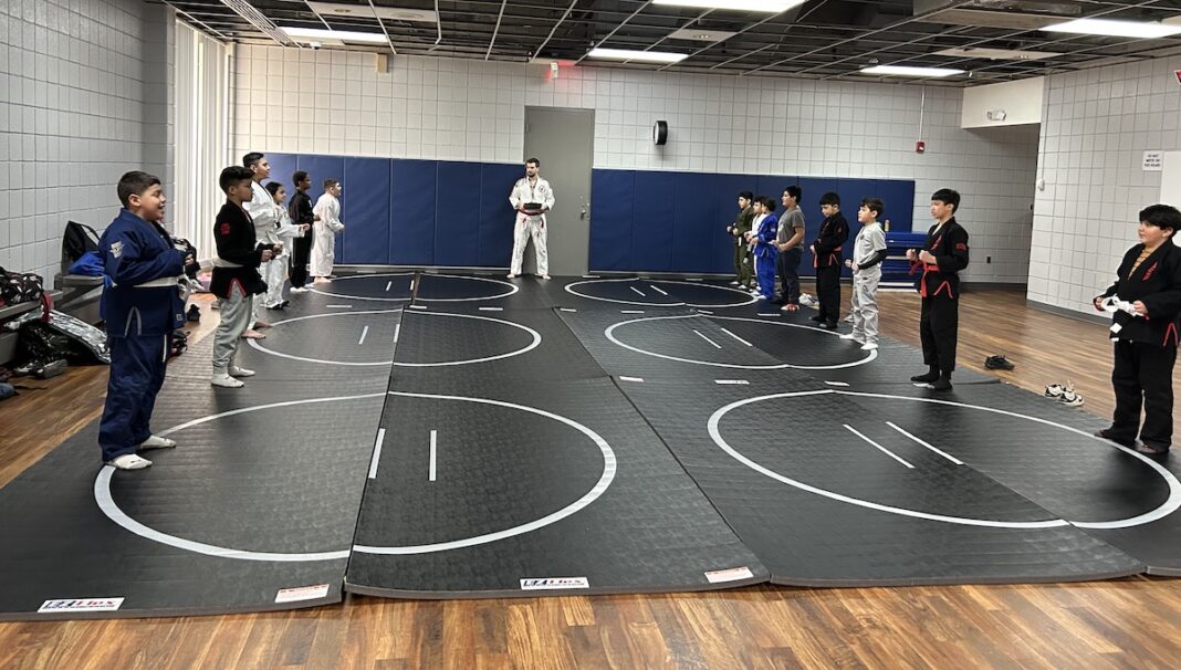 Charter school students at The Dearborn Academy practicing martial arts after school