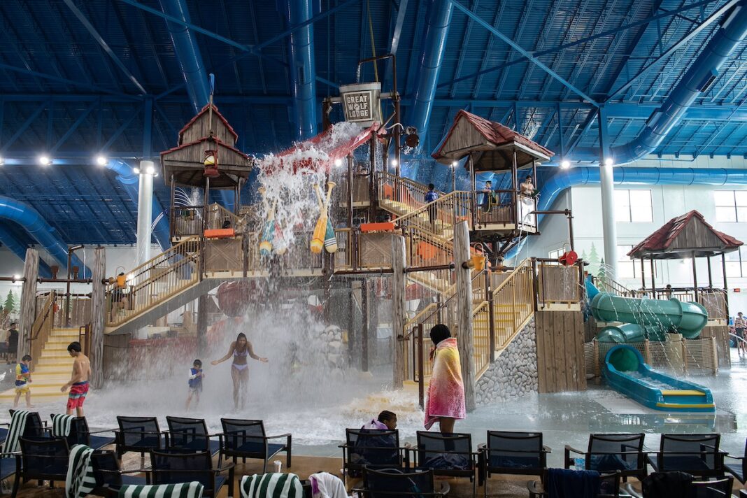 Kids and families enjoying the Fort Mackenzie multi-level water play structure at Great Wolf Lodge in Traverse City, Michigan.