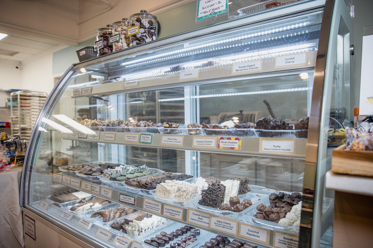 A delicious assortment of handmade chocolates and sweets on display at a downtown candy shop, one of the must-visit Bay City, Michigan attractions