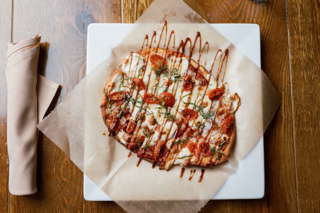 Delicious flatbread pizza served at a local restaurant, one of the top culinary attractions in Bay City, Michigan