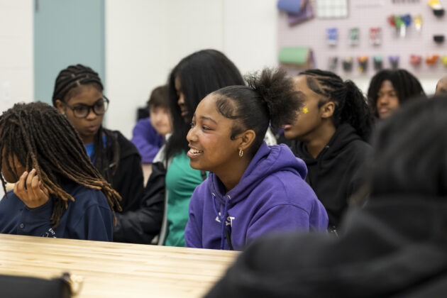 Detroit Achievement Academy students participating in a classroom discussion about their student-designed park project