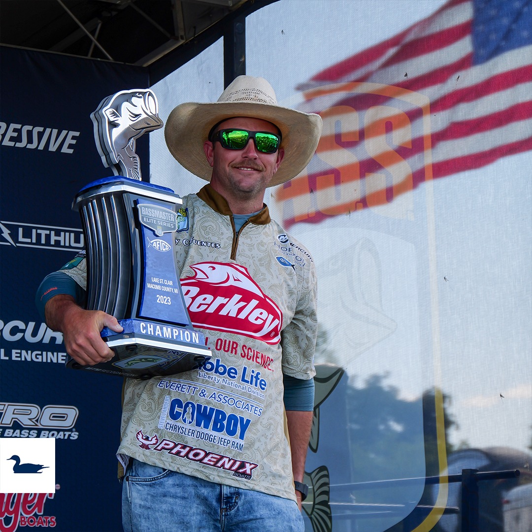 2023 Bassmaster Elite Tournament Chesterfield champion holding trophy at Lake St. Clair event in Macomb County, Michigan.