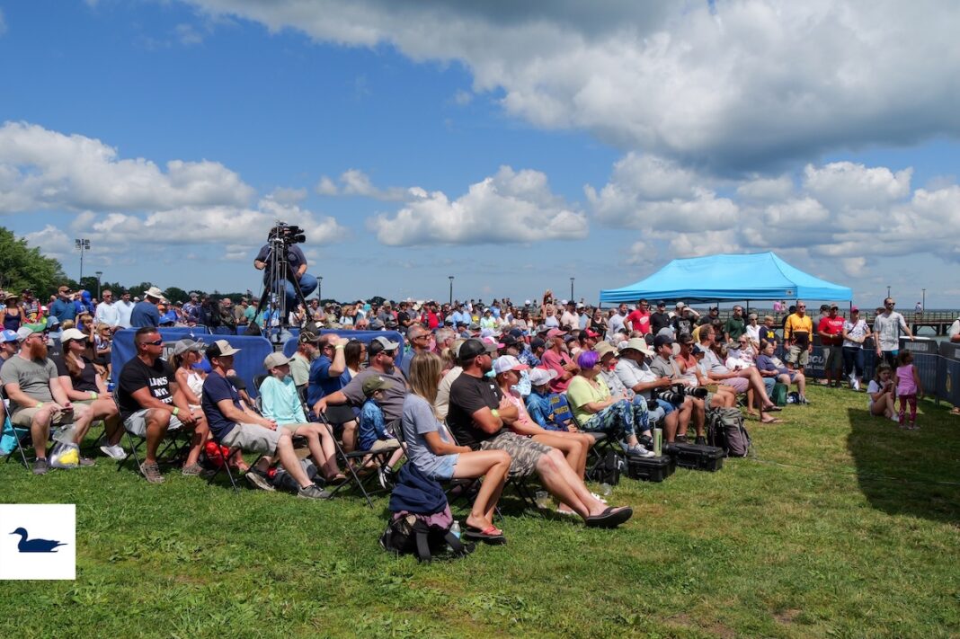 Large crowd enjoying festivities at the 2023 Bassmaster Elite Tournament in Chesterfield, Michigan near Lake St. Clair.