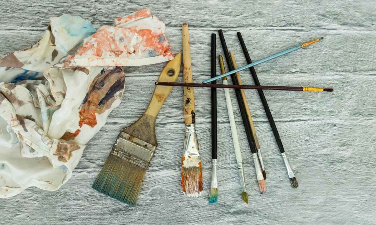 Paintbrushes and art supplies representing creativity at the Detroit Institute of Arts Contemporary Anishinaabe Art exhibition