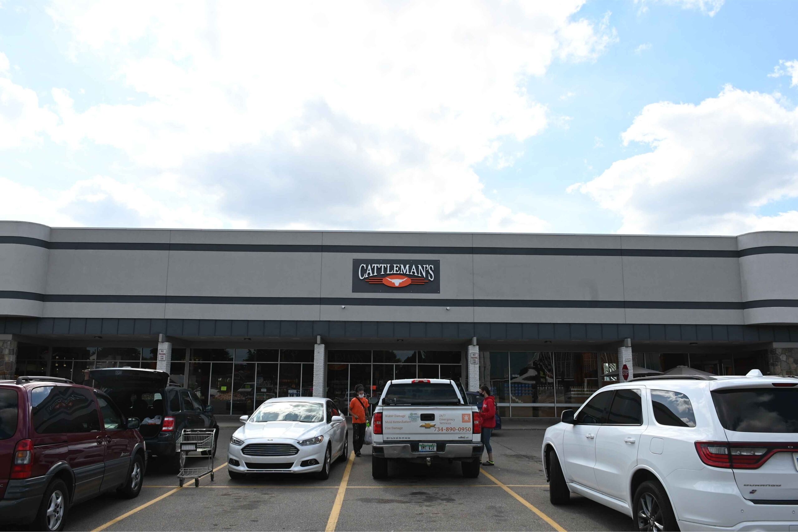 Cattleman’s Meats store in Center Line, Michigan, with cars parked outside and shoppers visiting this popular Macomb County market.