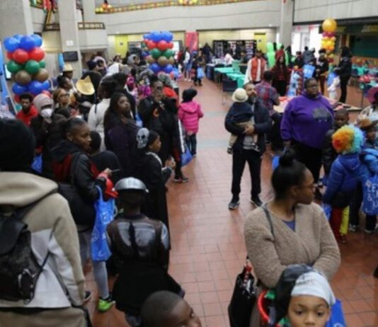 Families and kids gather at Detroit HarvestFest to enjoy games contests prizes and activities during the free community Halloween event.