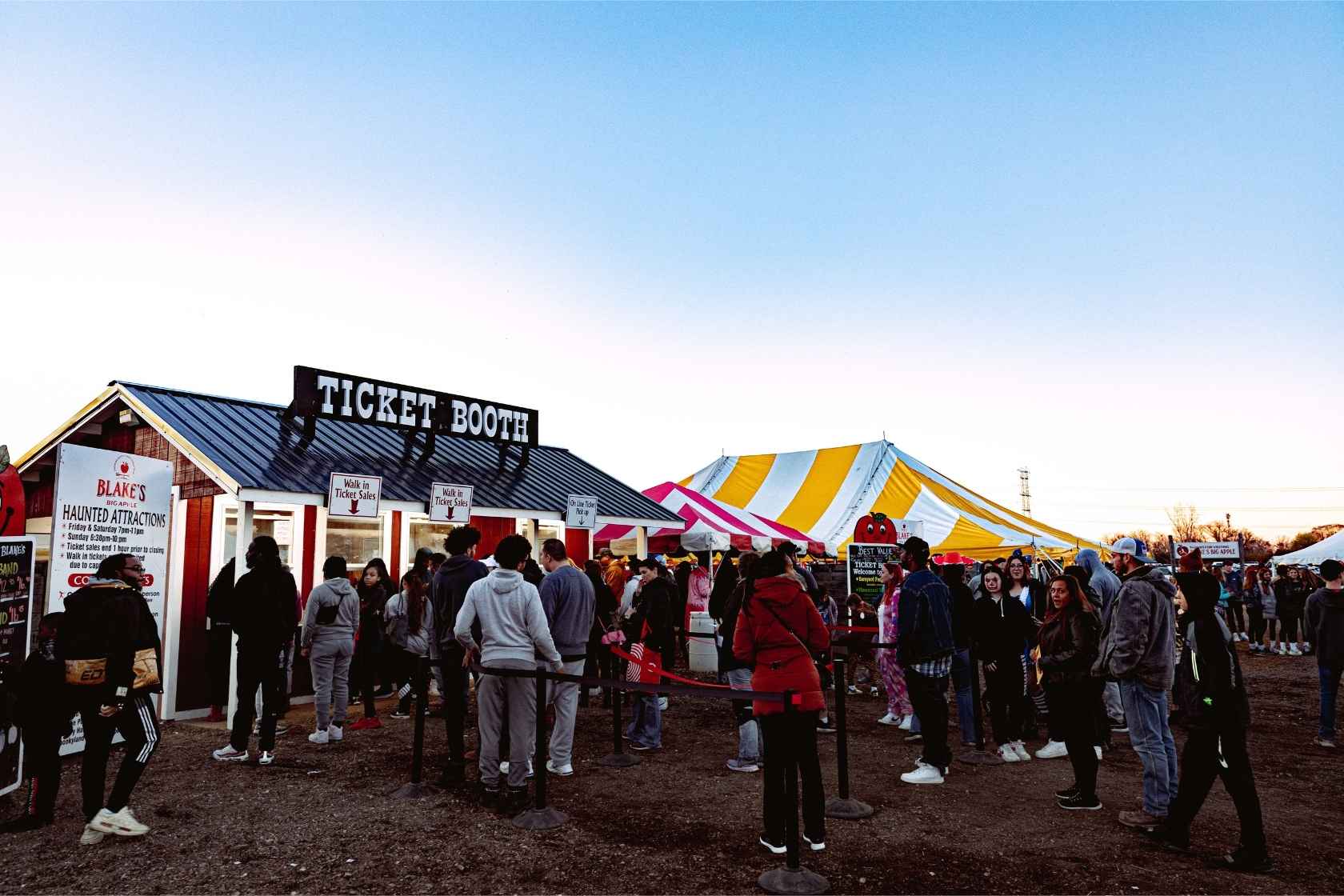 Families wait in line at the ticket booth for Blake’s haunted attractions in metro Detroit during Halloween season.