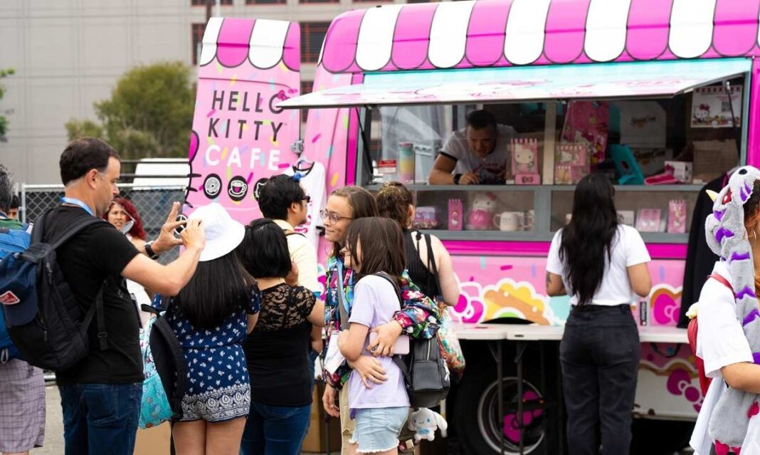 Families gather at the Hello Kitty Cafe Truck at Twelve Oaks Mall in Novi as fans line up for sweets and collectible items.
