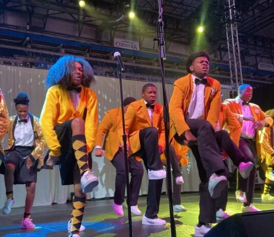 Members of the Detroit Youth Choir perform on stage ahead of the Wicked: For Good screenings at Emagine Theatres across metro Detroit.