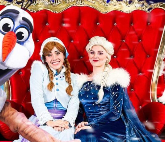 Frozen Christmas with Santa characters including a snowman mascot and two princess performers posing for families at Fairytale Fun Place event