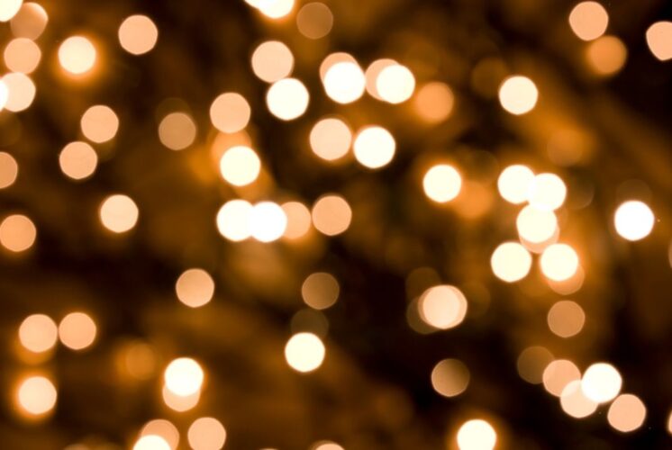 Holiday Lights Celebration Farmington Hills warm glowing light bokeh creating a festive backdrop for the community event