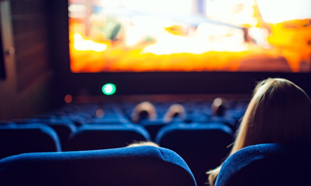 Moviegoers sitting in a theater during the SpongeBob and Patrick meet and greet Detroit tour tied to the new movie release