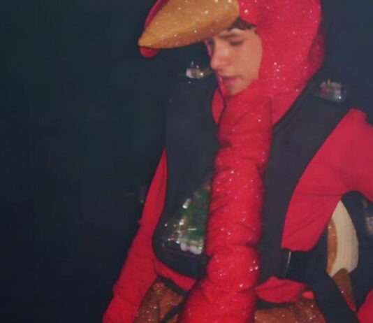 Player dressed in a turkey costume during the Turkey Tag Thanksgiving Laser Bash at Paradise Park in Novi enjoying the family laser tag event.