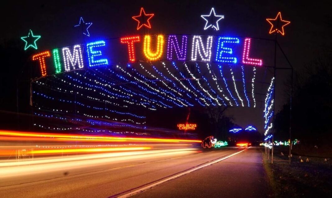 Wayne County Lightfest Time Tunnel glowing with colorful holiday lights along the five-mile drive-through route in Westland Michigan.