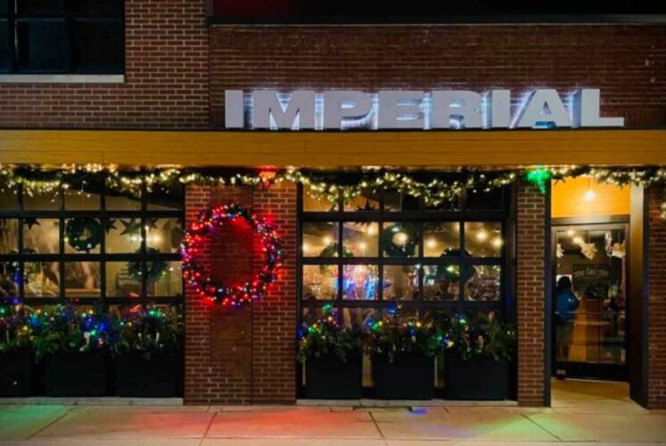 Exterior of Imperial in Ferndale decorated with holiday lights and greenery for La Posada de Imperial Ferndale event