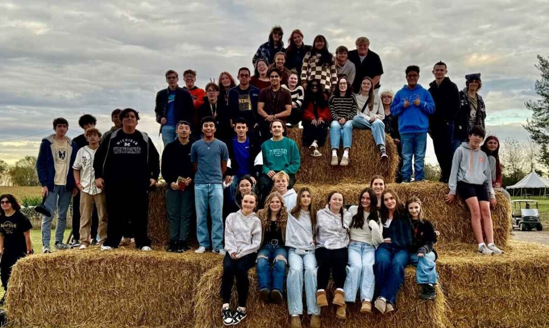 International Academy of Macomb students gather during a community event that highlights peer connection and school culture