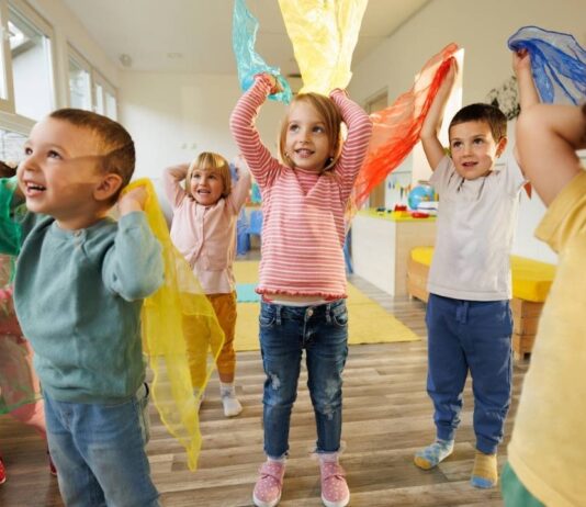 Kara Kaufmann music performance at Ann Arbor Hands On Museum Kids dance and move during the Kara Kaufmann music performance at Ann Arbor Hands On Museum enjoying an interactive show for young children