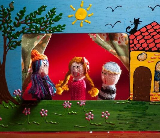 Winter woods puppet show at Ann Arbor Hands On Museum Handmade animal puppets on a small stage for the Winter Woods puppet show at Ann Arbor Hands On Museum during Hands On Holidays