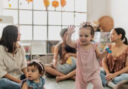 A2SO KinderConcert toddlers enjoy music and movement as young children dance and play during a kid-friendly orchestra concert at the library