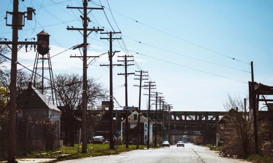 A Detroit neighborhood street with aging infrastructure, illustrating housing and access challenges facing families in the nation’s neediest city.