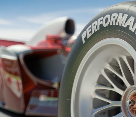 Michigan Central Race Days highlights motorsports innovation with a close-up of a high-performance racing car during the event at Michigan Central