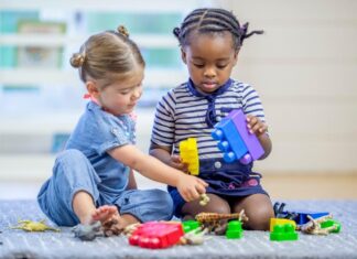 Detroit Parent Answers: What are some affordable preschool options in Detroit? Preschoolers playing and learning together at Morning Munchkins Red Oaks Nature Center during a hands on nature program for young children