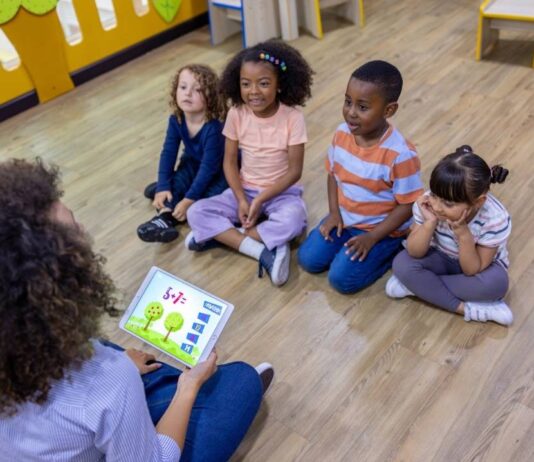 PREK Story and STEAM at 333 North Hill Circle Preschool children taking part in PREK Story and STEAM class with a teacher leading hands-on learning and early STEM activities
